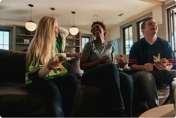 Students relaxing together in a shared living room