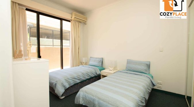 room-for-2-people-hotel-living-in-south-brisbane-room-with-two-beds