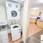 inner-city-resort-style-unit-shared-room-laundry-area